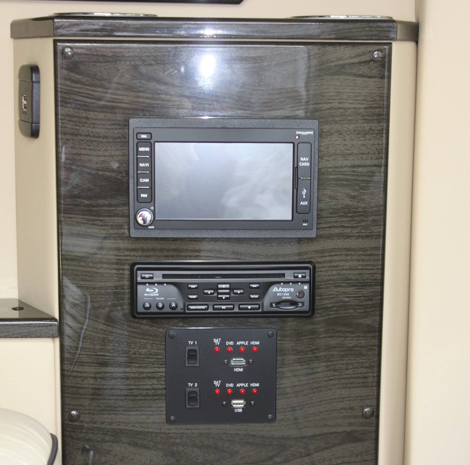 RV rental entertainment & navigation control panel, featuring a Blu-ray player, USB, and HDMI inputs for media.