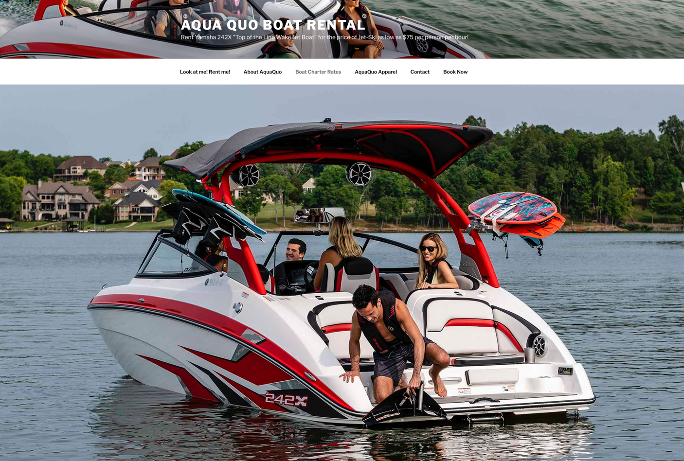 A sleek Yamaha 242X wake boat on a lake with people enjoying water sports. This boat rental offers lake adventures, like an RV rental for water exploration.