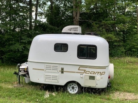 This compact white Scamp travel trailer is an ideal RV rental