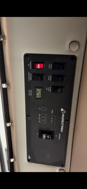 ready for your next trip.|RV rental interior dashboard with automatic gear shifter — photo 9