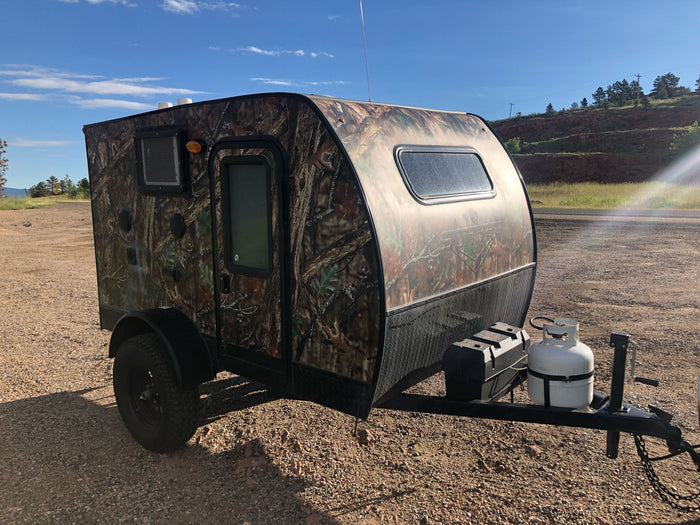 ideal for your next RV rental adventure.|Enjoy lakeside camping with this rv rental's outdoor kitchen