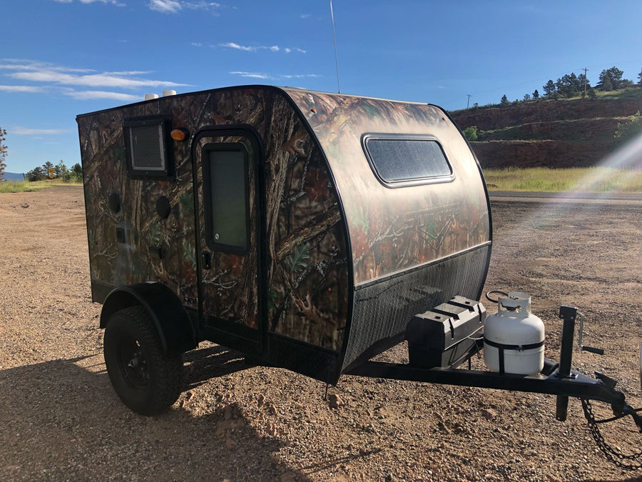 ideal for your next RV rental adventure.|Enjoy lakeside camping with this rv rental's outdoor kitchen
