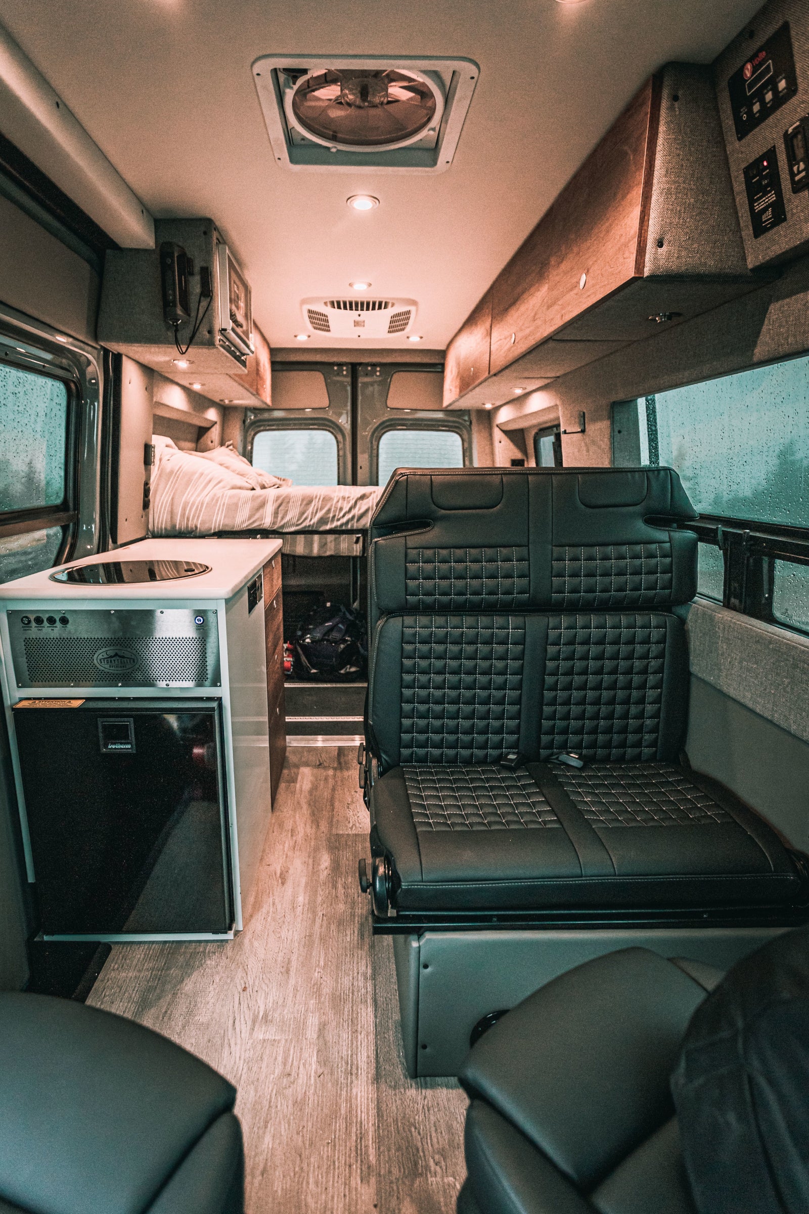 showing controls & braided power cable.|This RV rental features a pull-out induction cooktop drawer