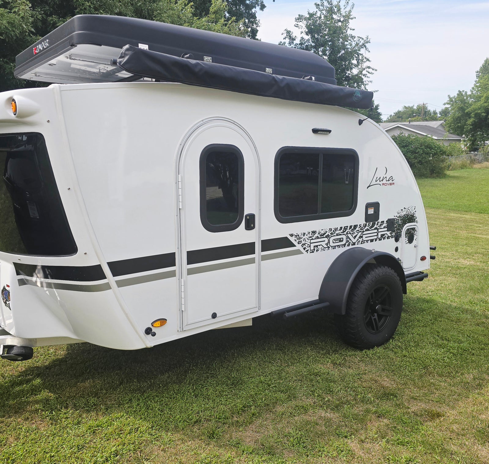 White Luna Rover teardrop camper, a perfect RV rental for memorable camping and travel.