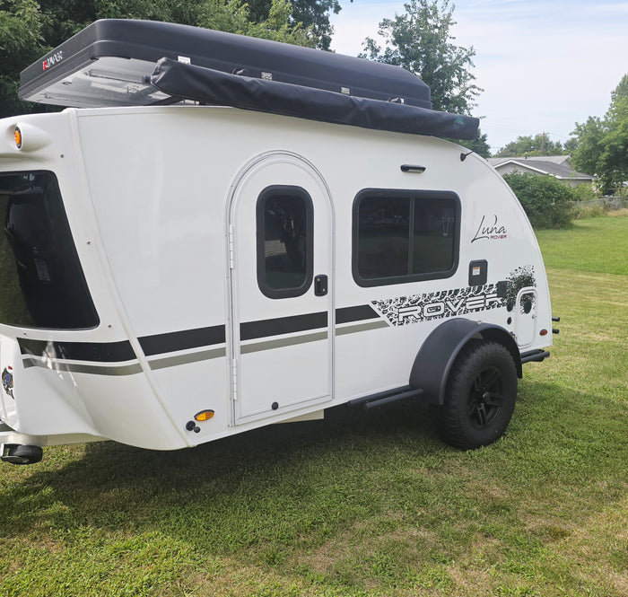White Luna Rover teardrop camper, a perfect RV rental for memorable camping and travel.