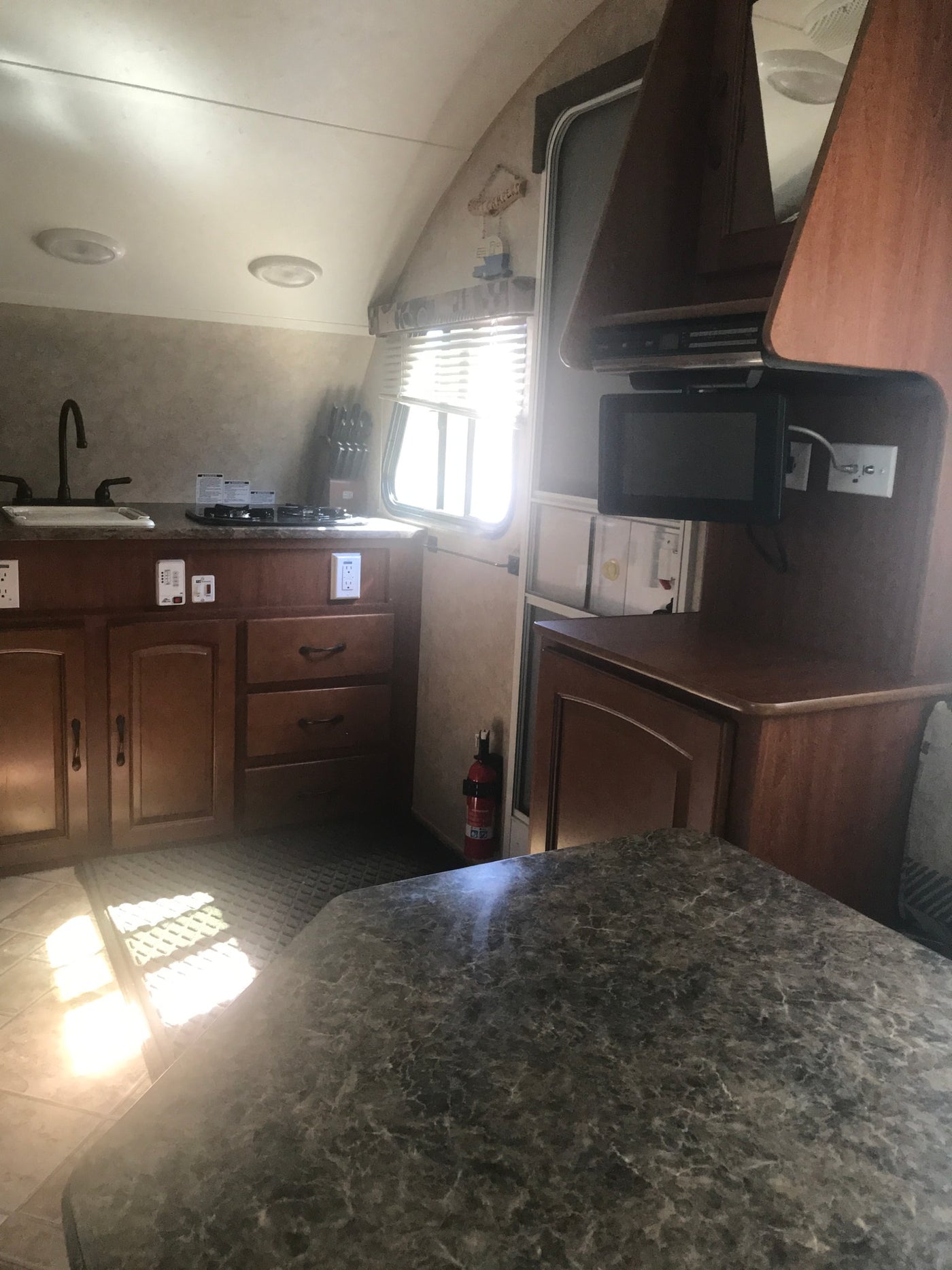 ready for adventure.|White r-pod travel trailer parked on grass. Ideal for RV rental adventures — photo 5