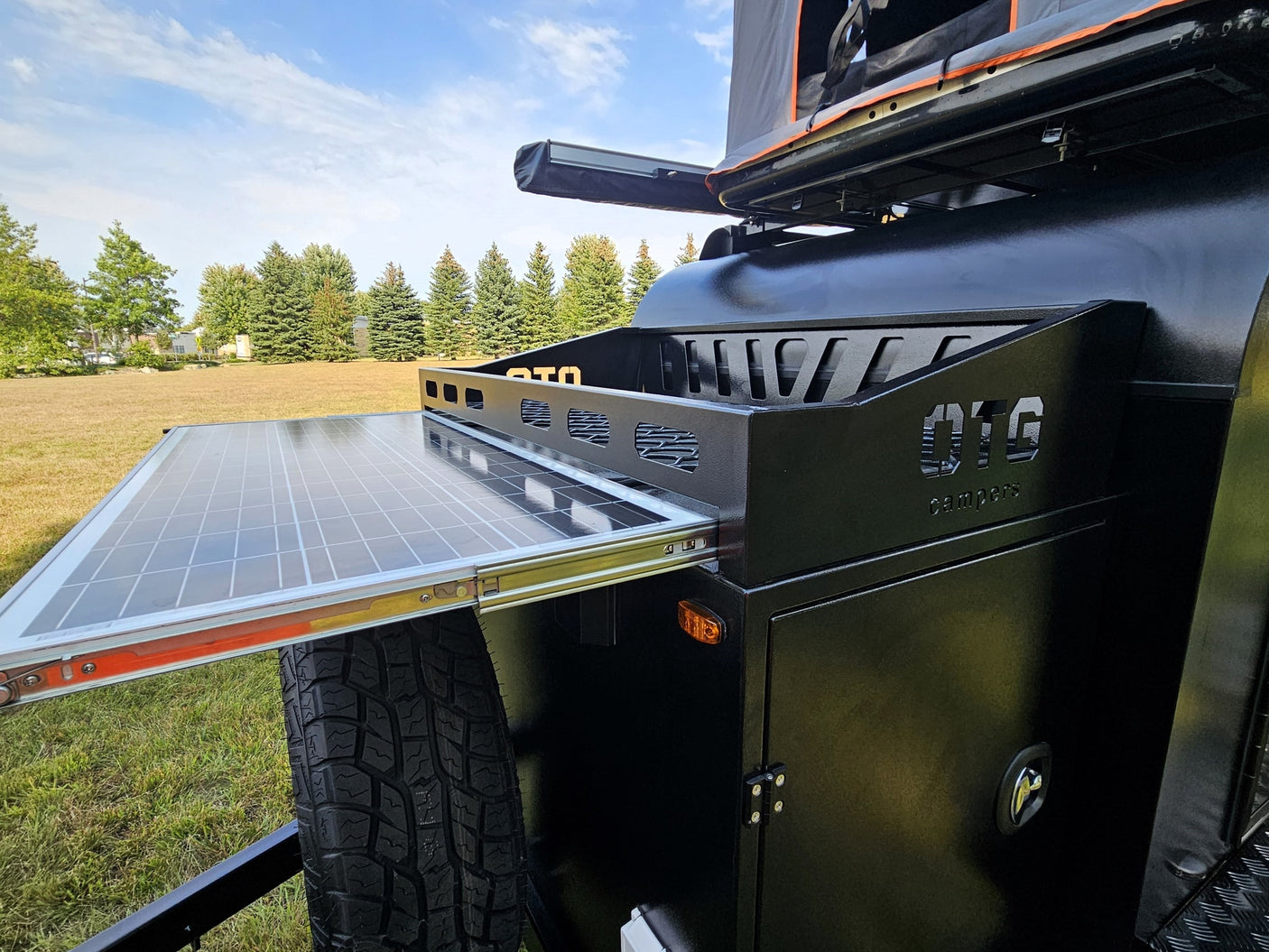 perfect for your next RV rental adventure.|Experience a cozy RV rental: view inside a rooftop tent with quilted walls
