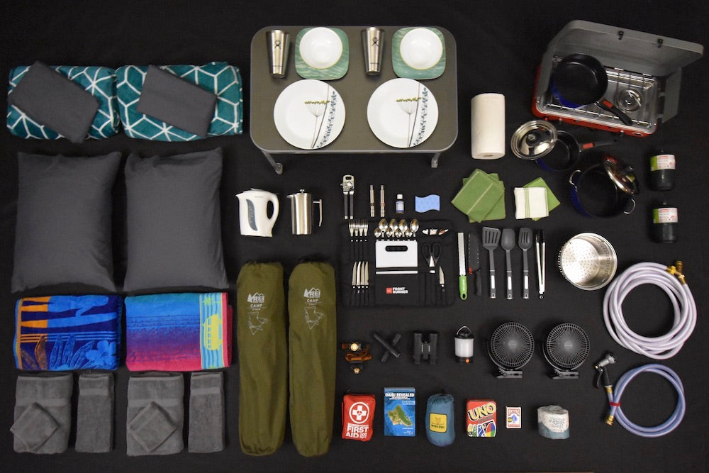 RV rental ready: a comprehensive display of bedding, kitchen, camping, entertainment, and safety gear.
