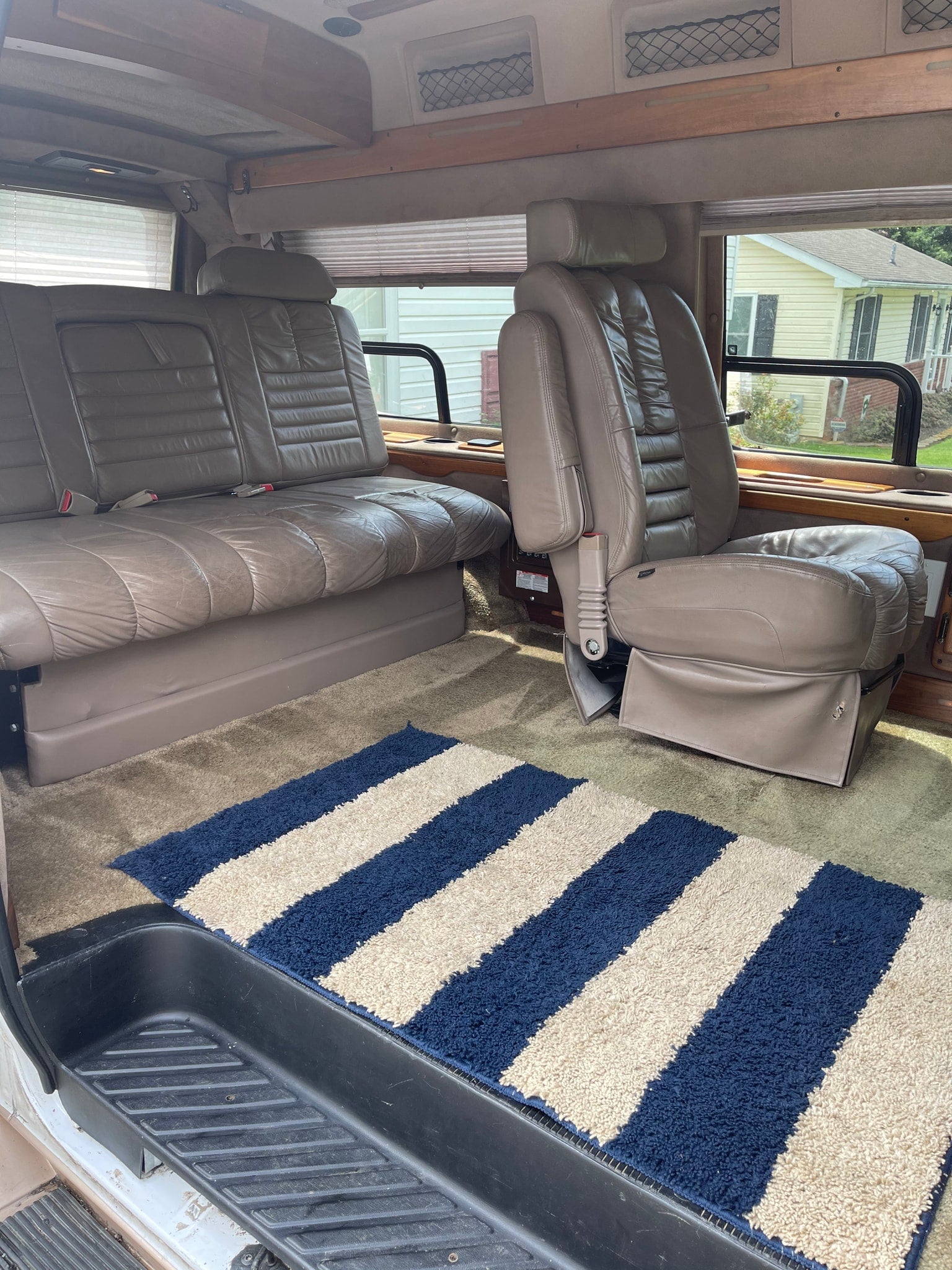 offering comfort with window blinds and carpeting.|A compact