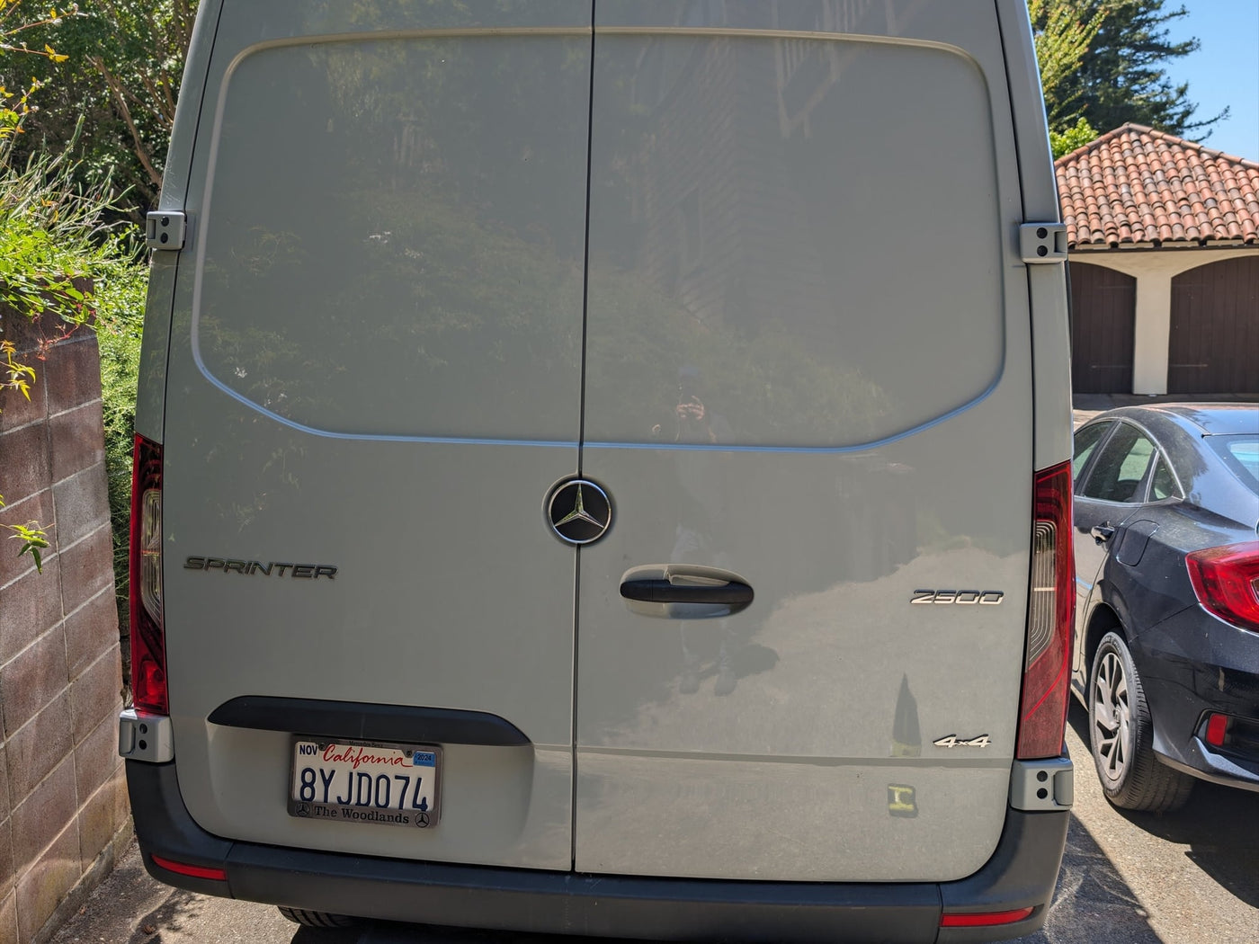 ideal for your next rv rental journey.|Rear of a white Mercedes-Benz Sprinter 2500 4x4 van — photo 4