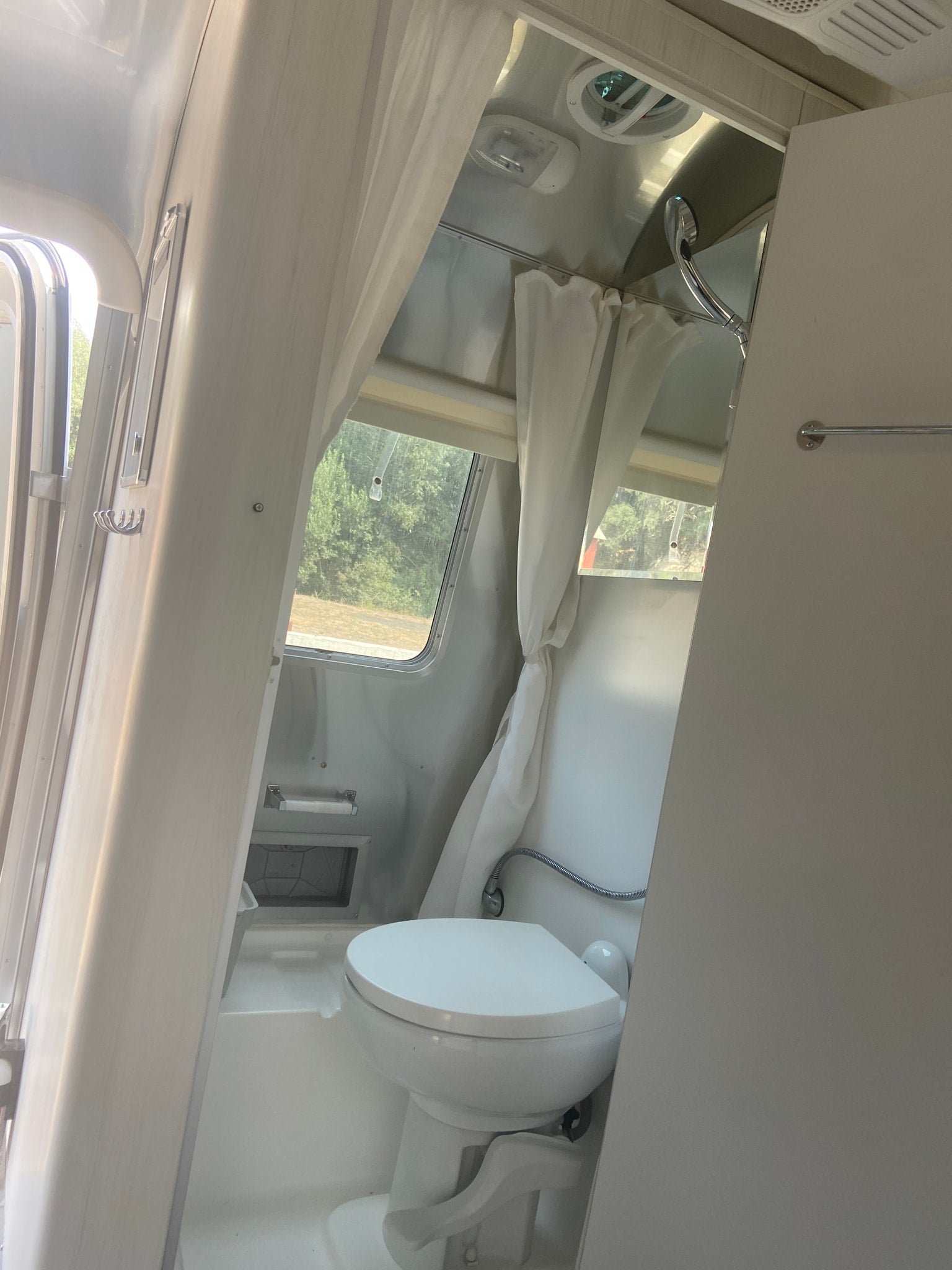 ready for adventure.|RV rental interior: compact kitchen with sink