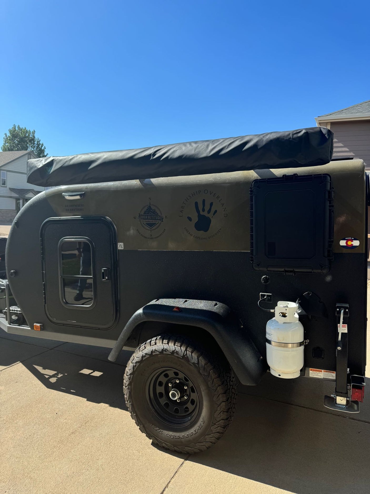 perfect for RV rental adventures.|This rugged olive & black teardrop RV rental is perfect for off-road camping. Features awning