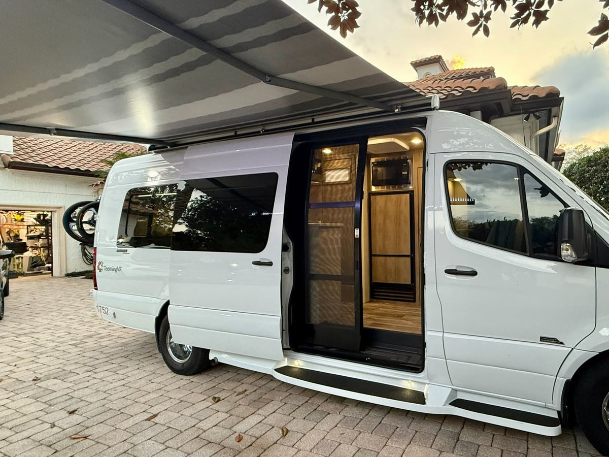 and outdoor seating. Ideal for road trip adventures.|White Mercedes Sprinter camper van RV rental — photo 3