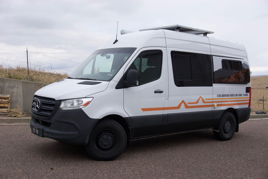 White Mercedes Sprinter camper van