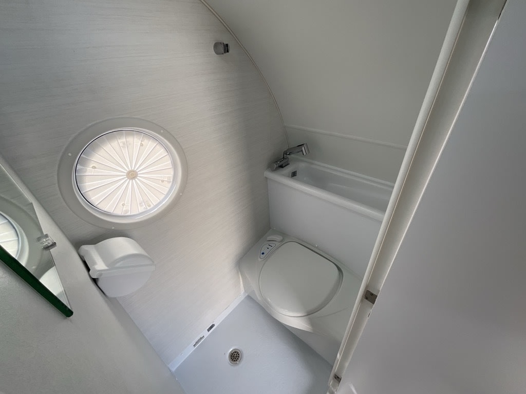 revealing its practical layout with integrated bathroom