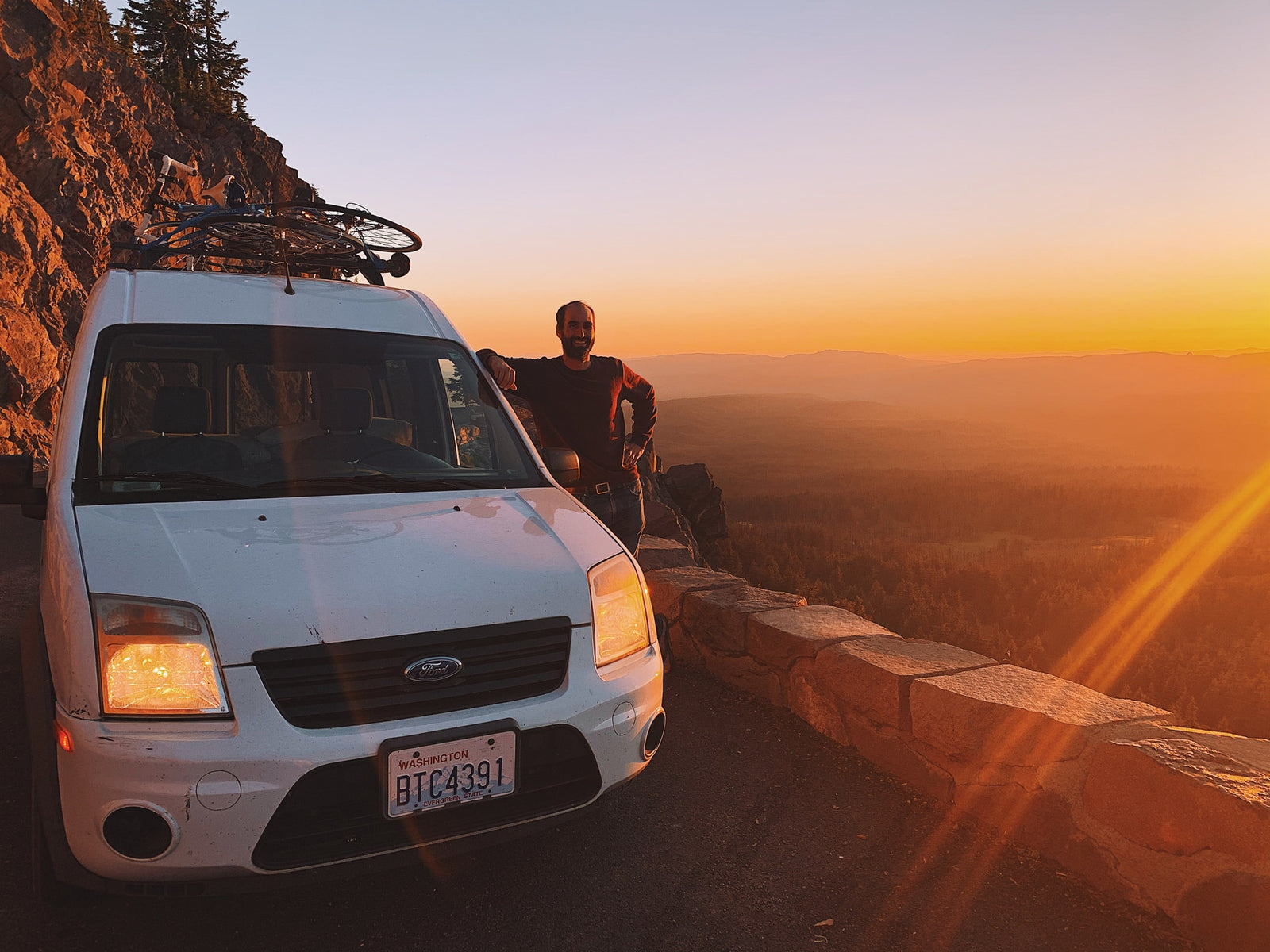 and wood panels. Ready for adventure!|Wooden ceiling with recessed LED lights and a vent fan in an RV rental. Ready for adventure and comfort on the road.|RV rental interior: A detailed view of a ceiling fan with blue blades