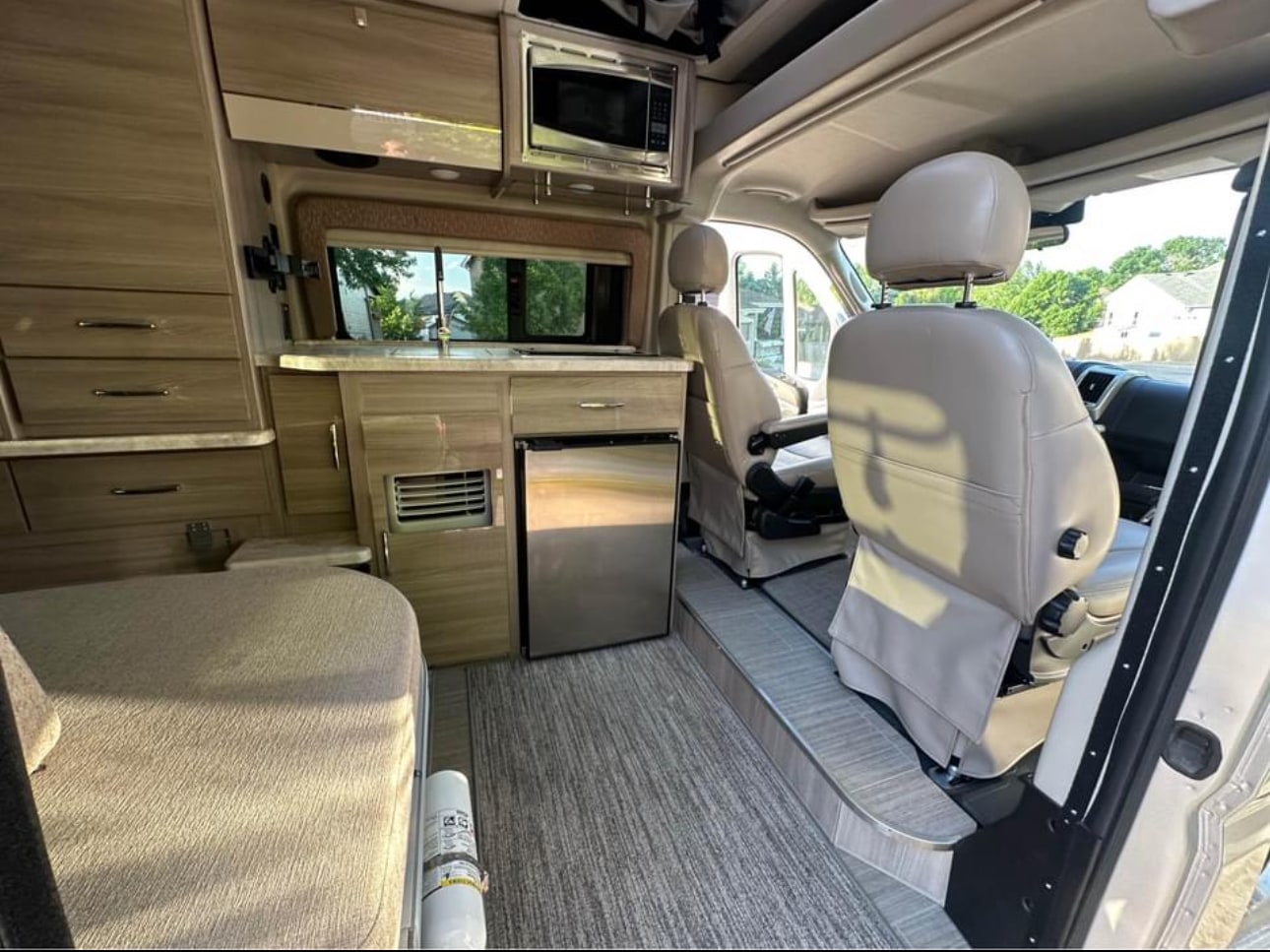 is parked and ready. Ideal for an RV rental and camping adventures.|Spacious RV rental front cabin