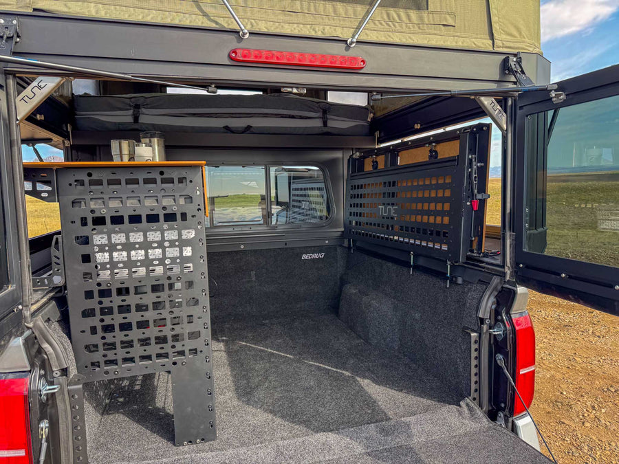 and Tune Outdoor propane tank mounted on a fully equipped pickup truck.|Explore off-grid! This Toyota Tacoma truck camper