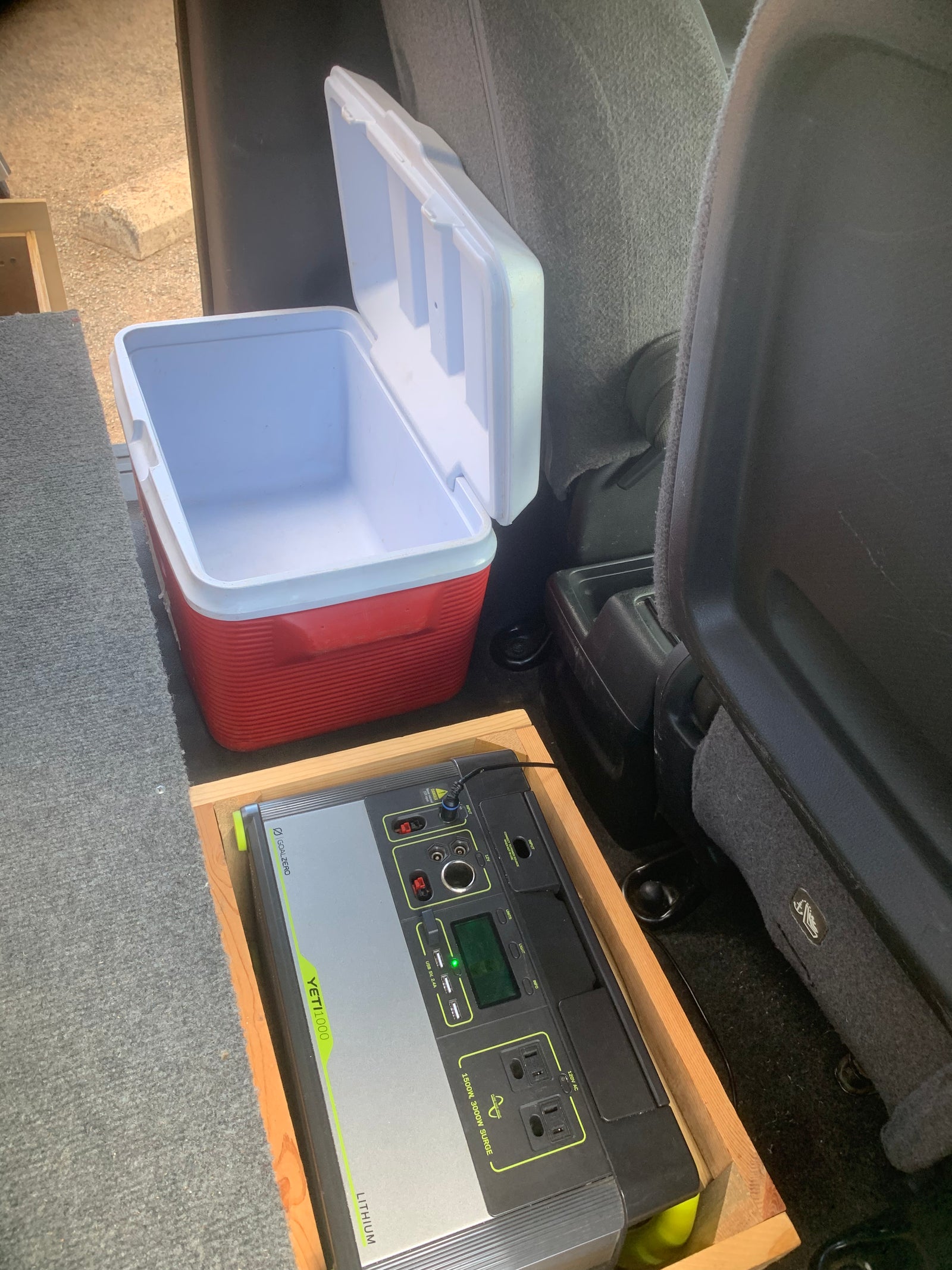 RV rental setup: Goal Zero Yeti 1000 portable power station and cooler secured in the vehicle interior.