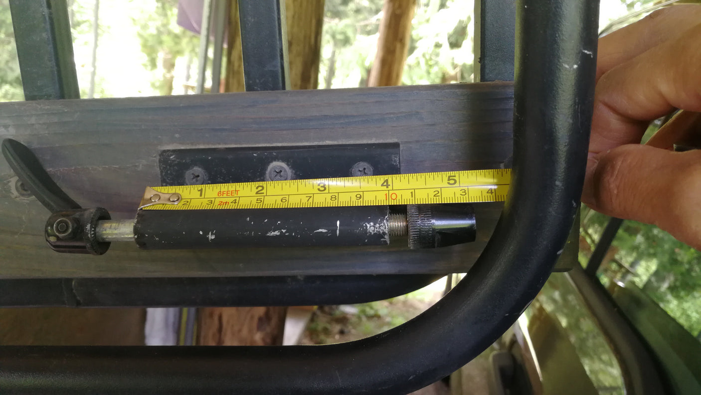 RV rental quick-release rod measured on a mounting bracket at approx. 5.5 inches, aiding part replacement.