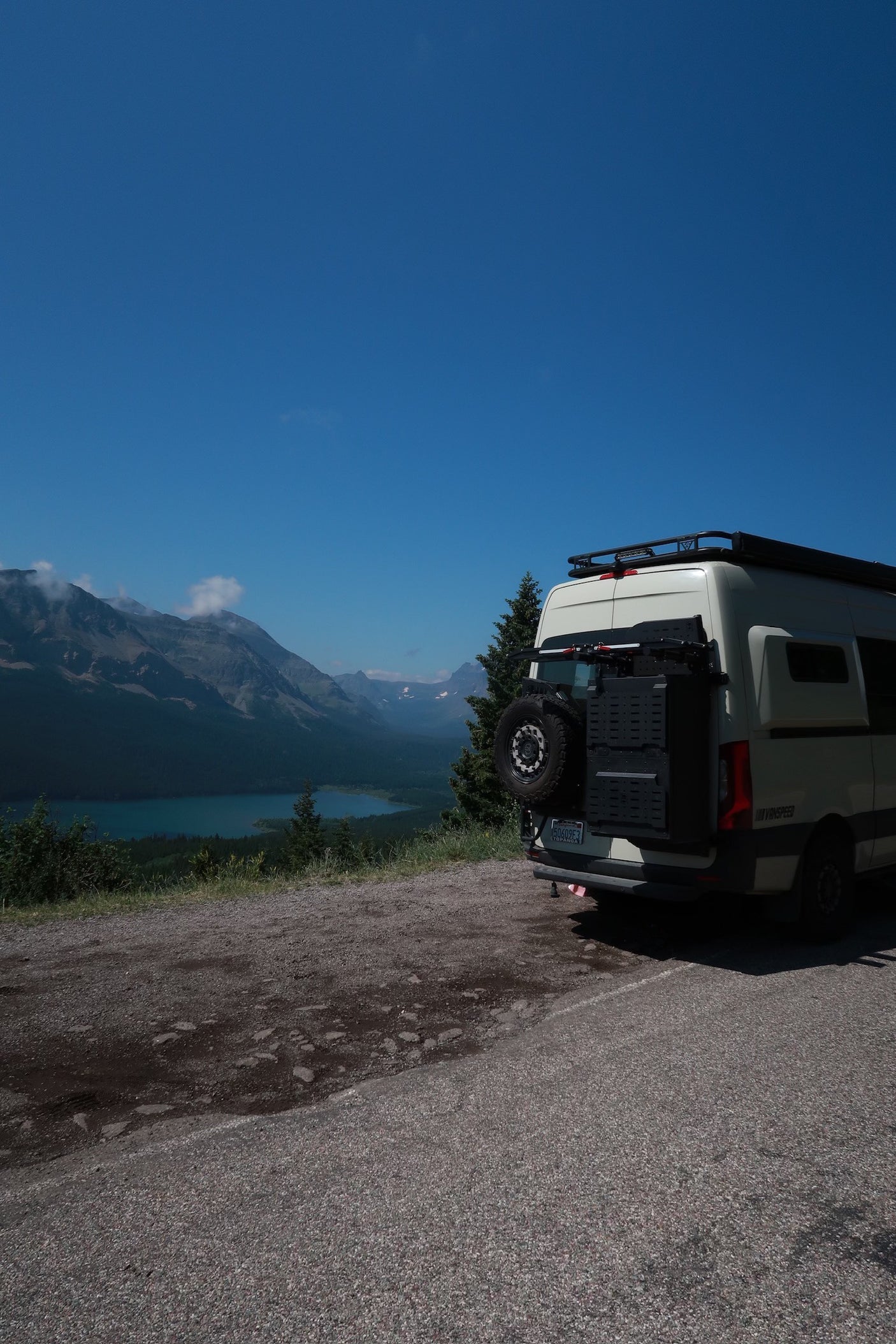 This RV rental offers a stunning mountain lake overlook view, perfect for scenic road trips and adventures.
