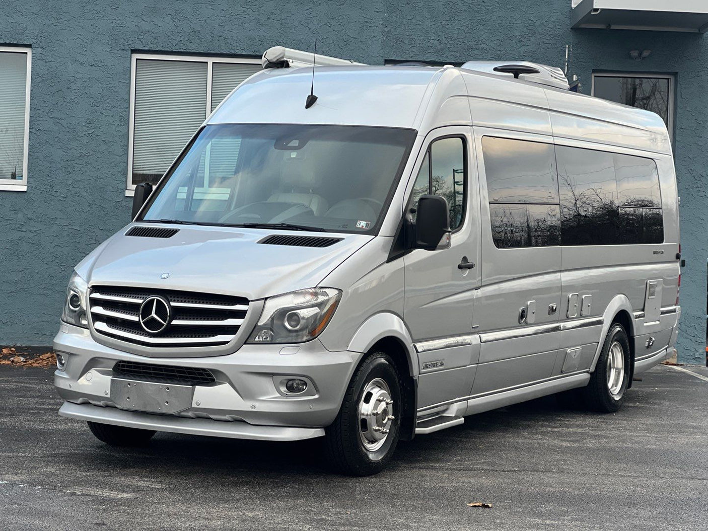 Stylish silver Mercedes-Benz Sprinter Airstream camper van RV rental