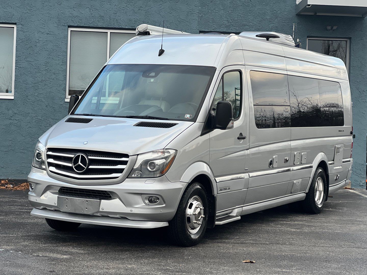Stylish silver Mercedes-Benz Sprinter Airstream camper van RV rental