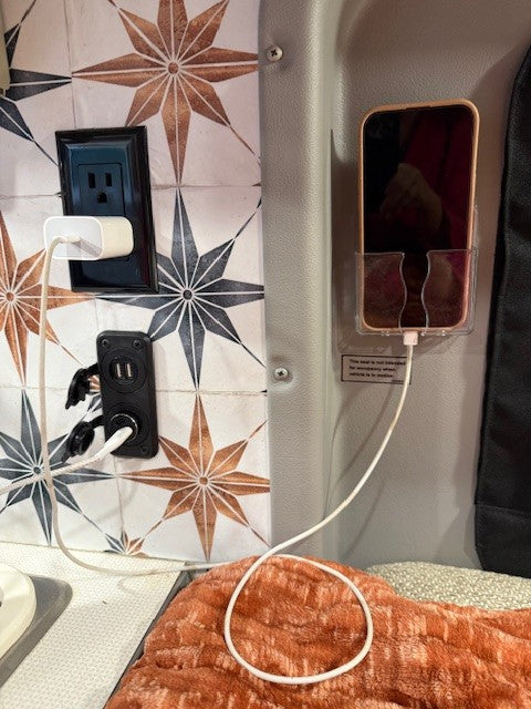 It is easy to charge phones using the convenient USP ports and phone holder.