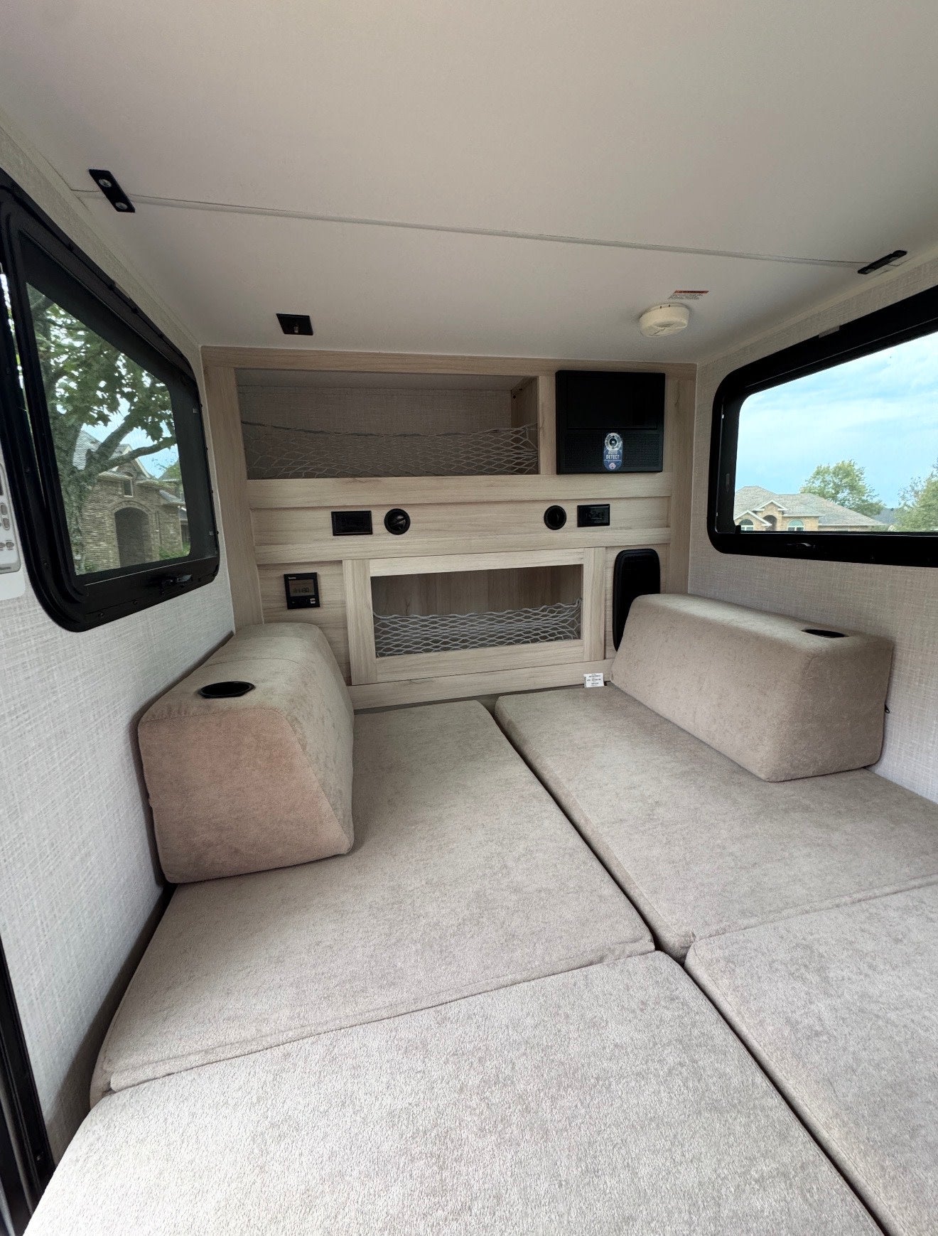 an excellent rv rental for your next outdoor camping adventure. Door open to interior.|This Bontrager Outdoors teardrop RV rental