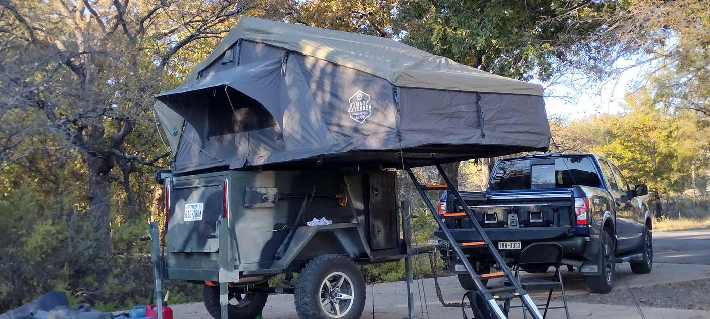 RV rental alternative: a rooftop tent on an overland trailer hitched to a truck