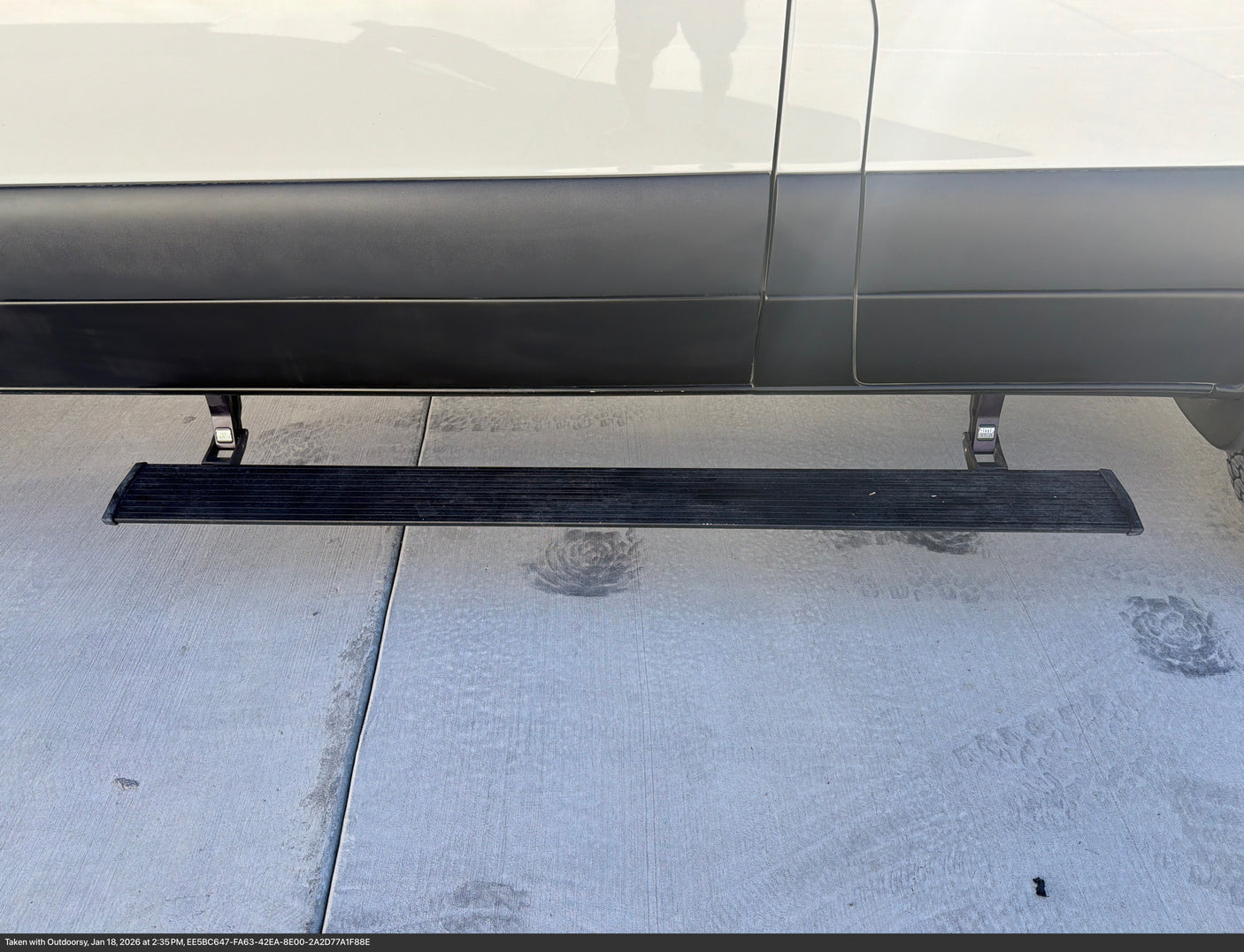 RV rental van with an extended Amp Research automatic power step, providing easy access to the vehicle.