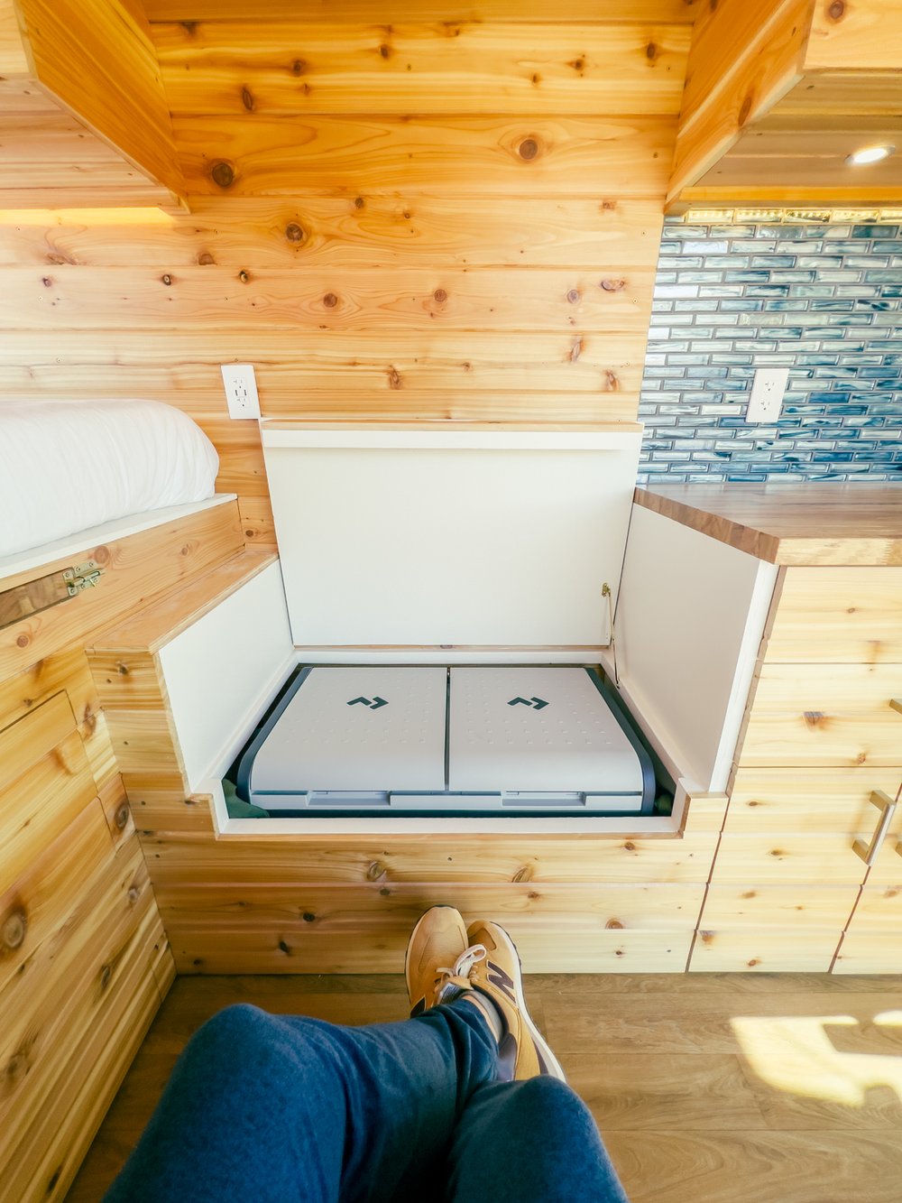 wood floor. Ideal for travel.|Explore this bright RV rental with warm wood walls