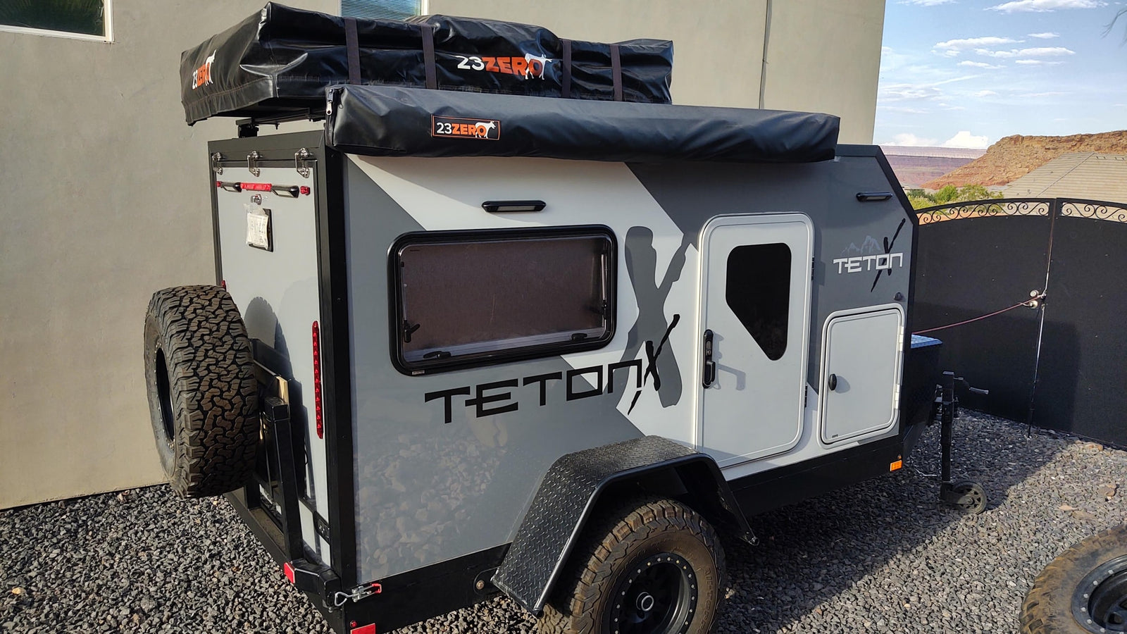 Rugged TetonX off-road teardrop camper with rooftop tent and awning. Ideal for adventure rv rental