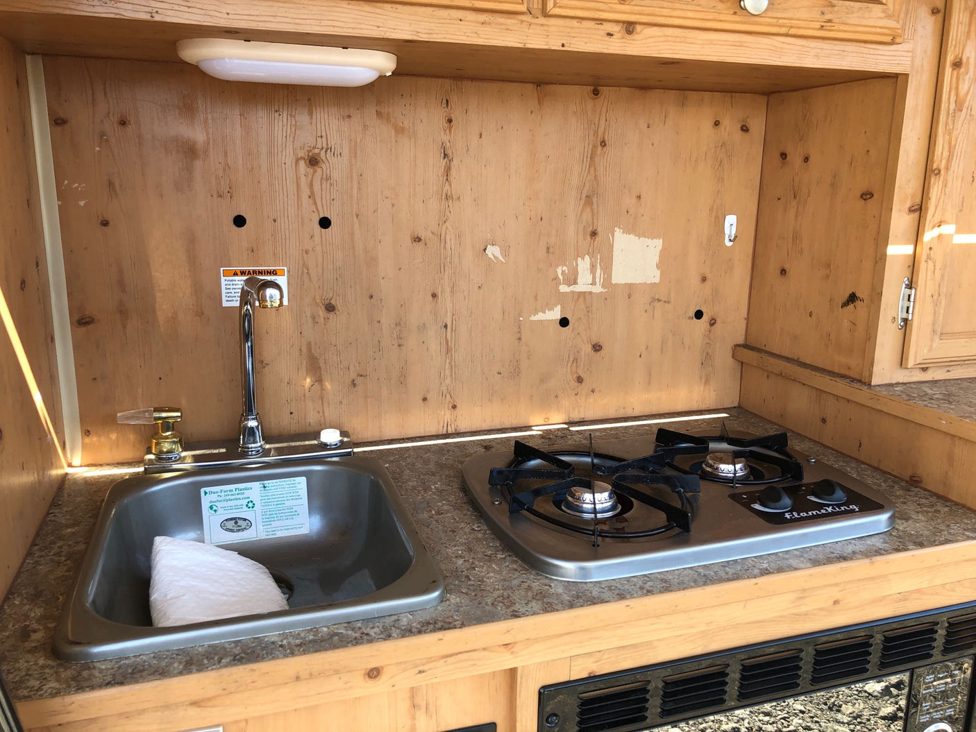 camouflaged teardrop camper for RV rental