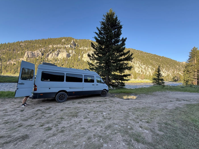 and bright curtains.|Looking into the back of this RV rental van