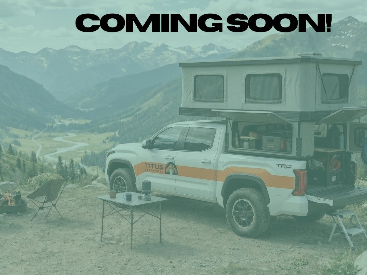 COMING SOON! This Titus Adventures truck camper RV rental offers mountain camping with a pop-top tent.