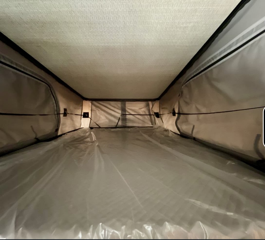 and smart storage solutions.|Explore this compact RV rental shower/bathroom. Features a shower head