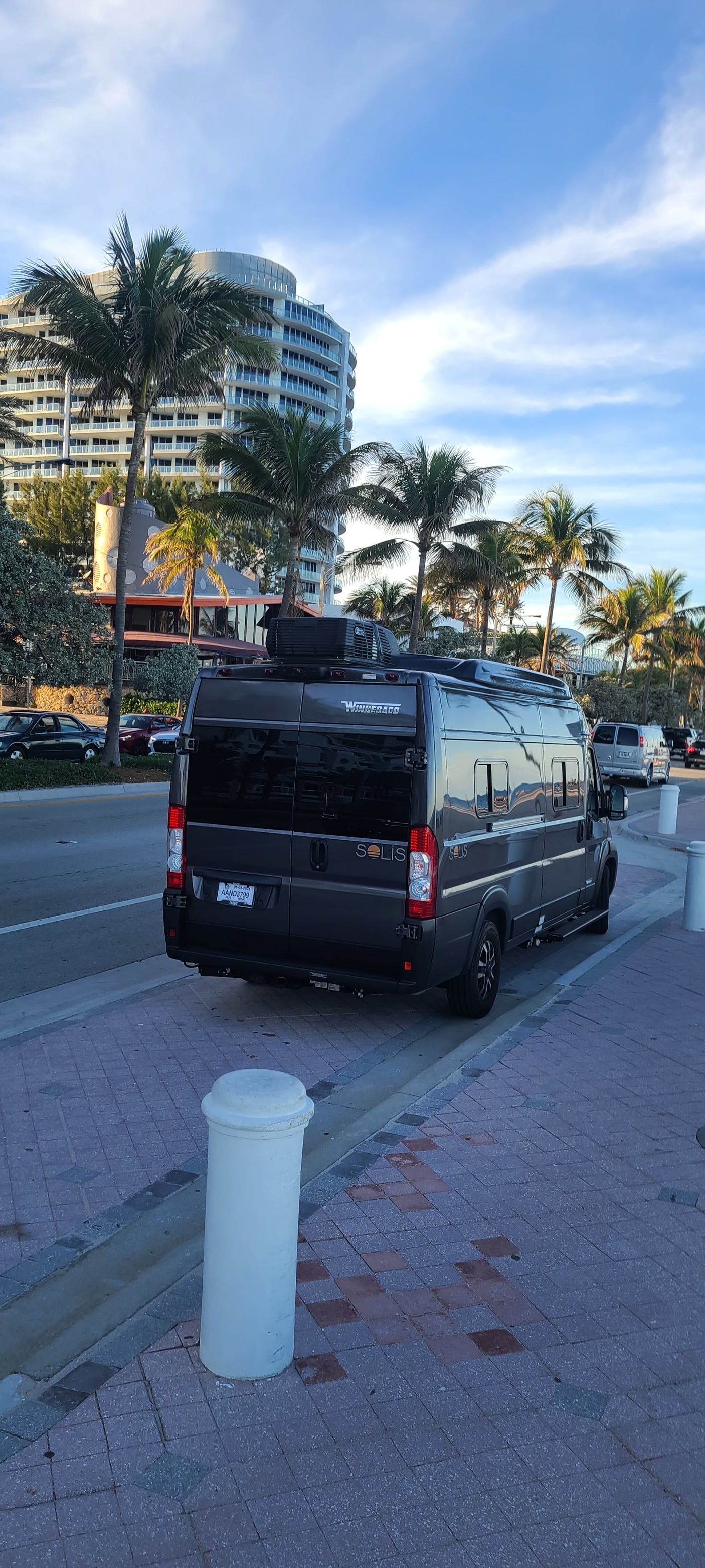 ready for beach adventures under sunny skies and swaying palms.|Inside an RV rental: driver's view of the modern dashboard