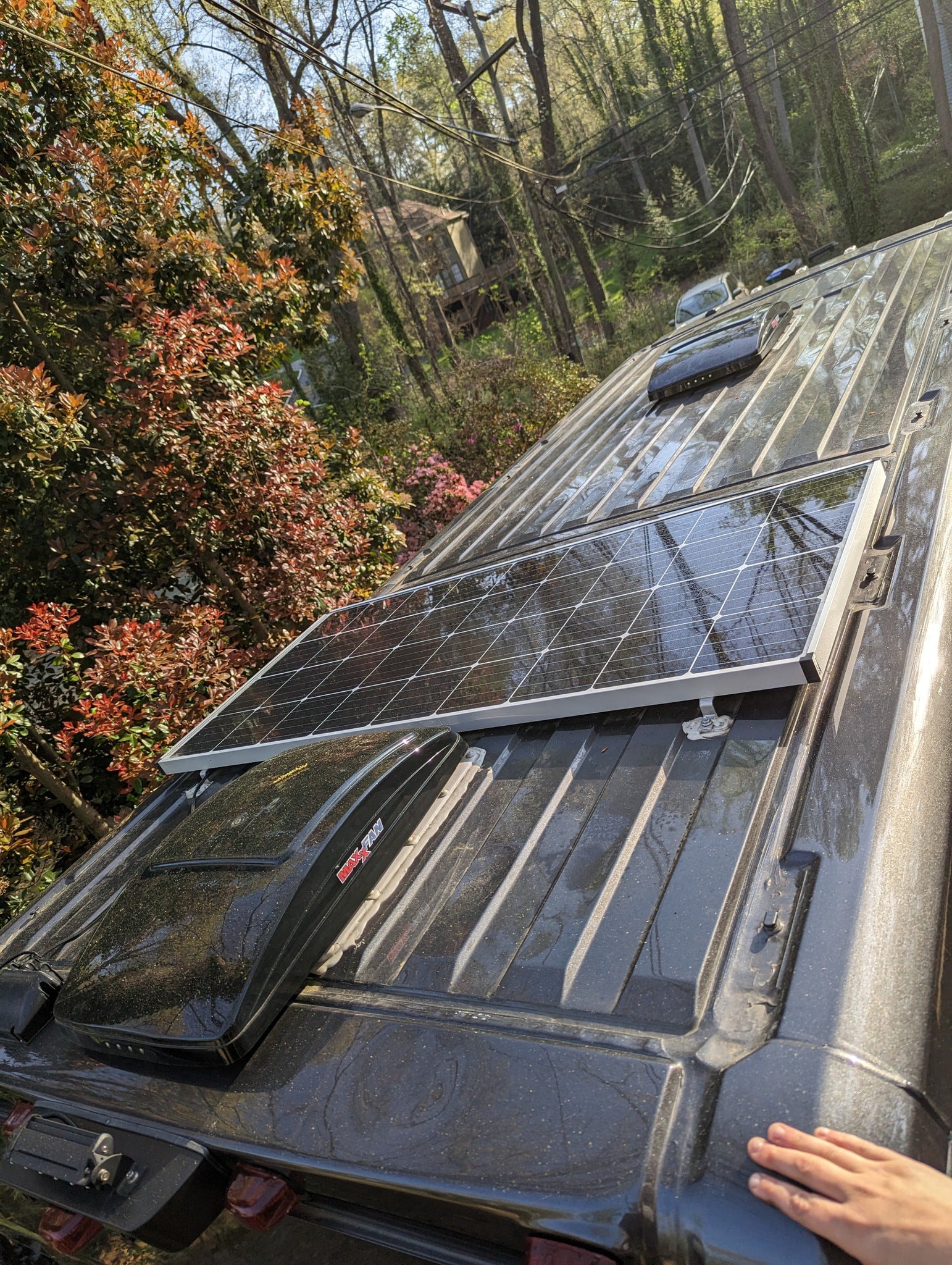 with the door open to nature.|RV rental's cozy interior: comfy bed