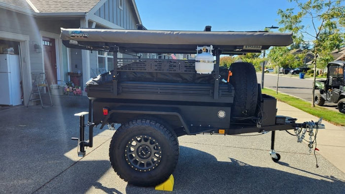 perfect for an rv rental adventure. Includes large off-road tires & spare.|This rugged overland trailer