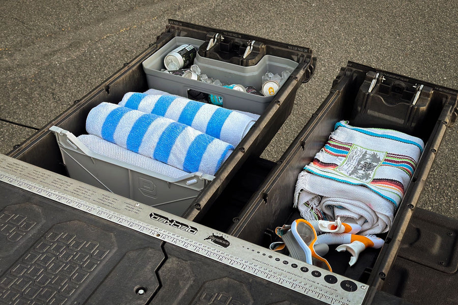 ready for adventure. Discover similar journeys with an RV rental experience.|An RV rental Jeep Gladiator with rooftop tent and awning provides comfort for friends enjoying an outdoor glamping trip.|Friends enjoy an outdoor movie projected from a truck