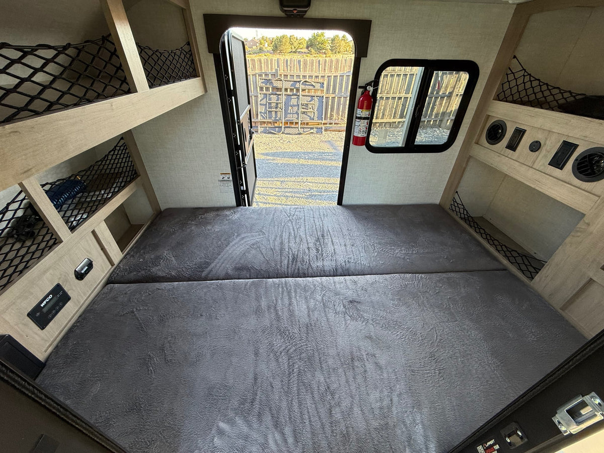 & shadows on cream surface.|Discover this RV rental outdoor kitchen — photo 8