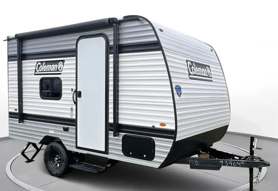 This gray and white Coleman travel trailer is ideal for RV rental