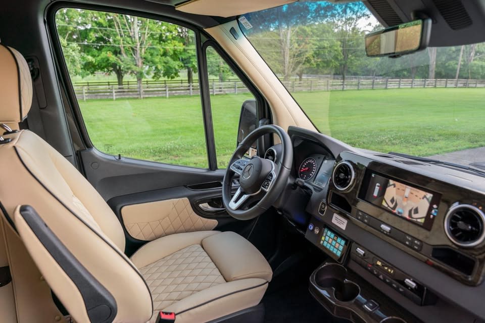 and controls.|Overhead floor plan of a Mercedes-Benz Sprinter luxury van interior