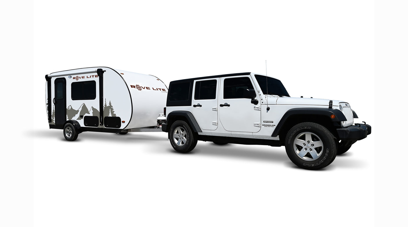 White Jeep Wrangler towing a Rove Lite teardrop camper, an RV rental perfect for camping adventures.