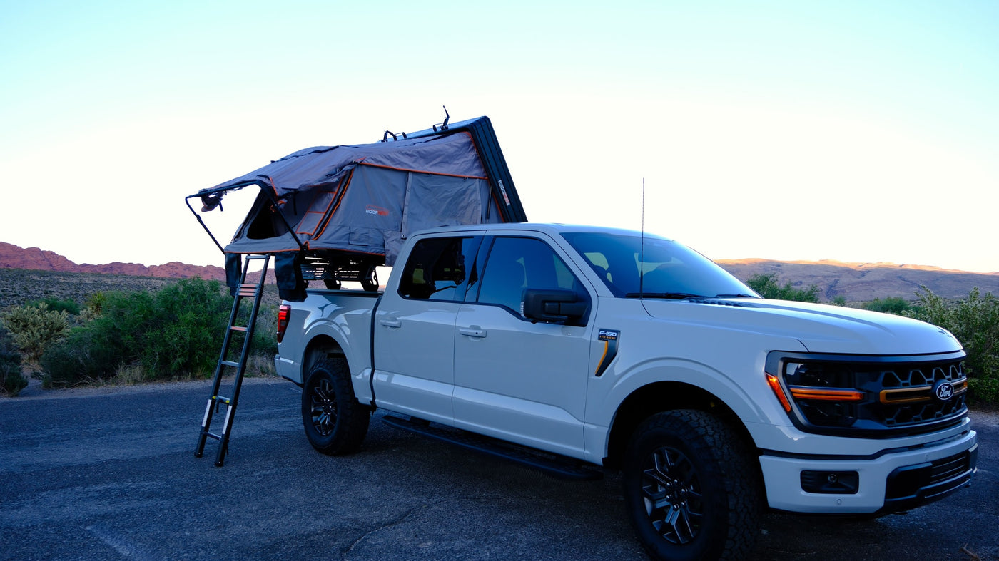 This Ford F-150 with a Roofnest rooftop tent offers an adventure-ready RV rental experience for off-grid camping in the desert. — photo 3