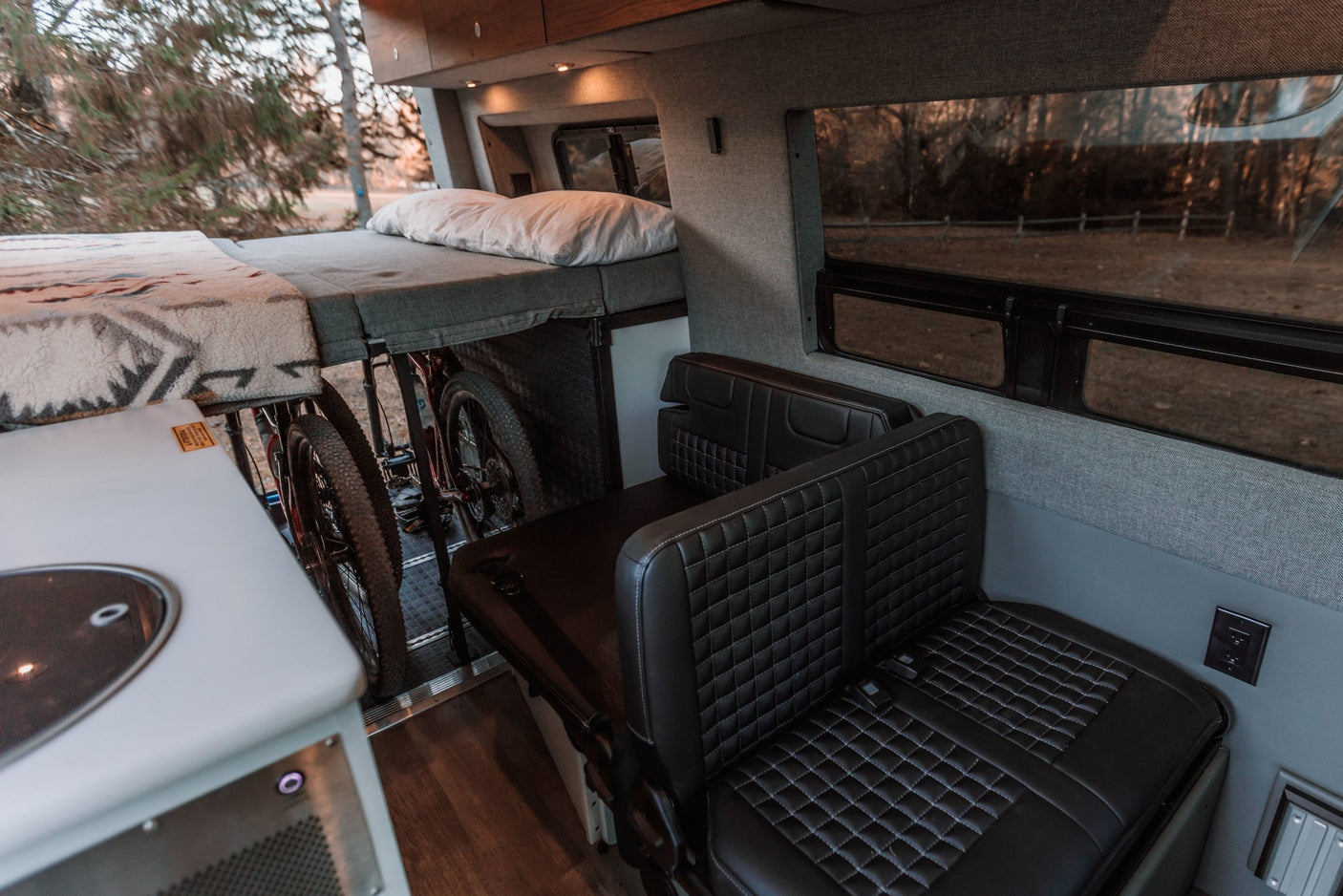 and boots for travel.|Close-up of a Furrion portable speaker mounted inside an rv rental