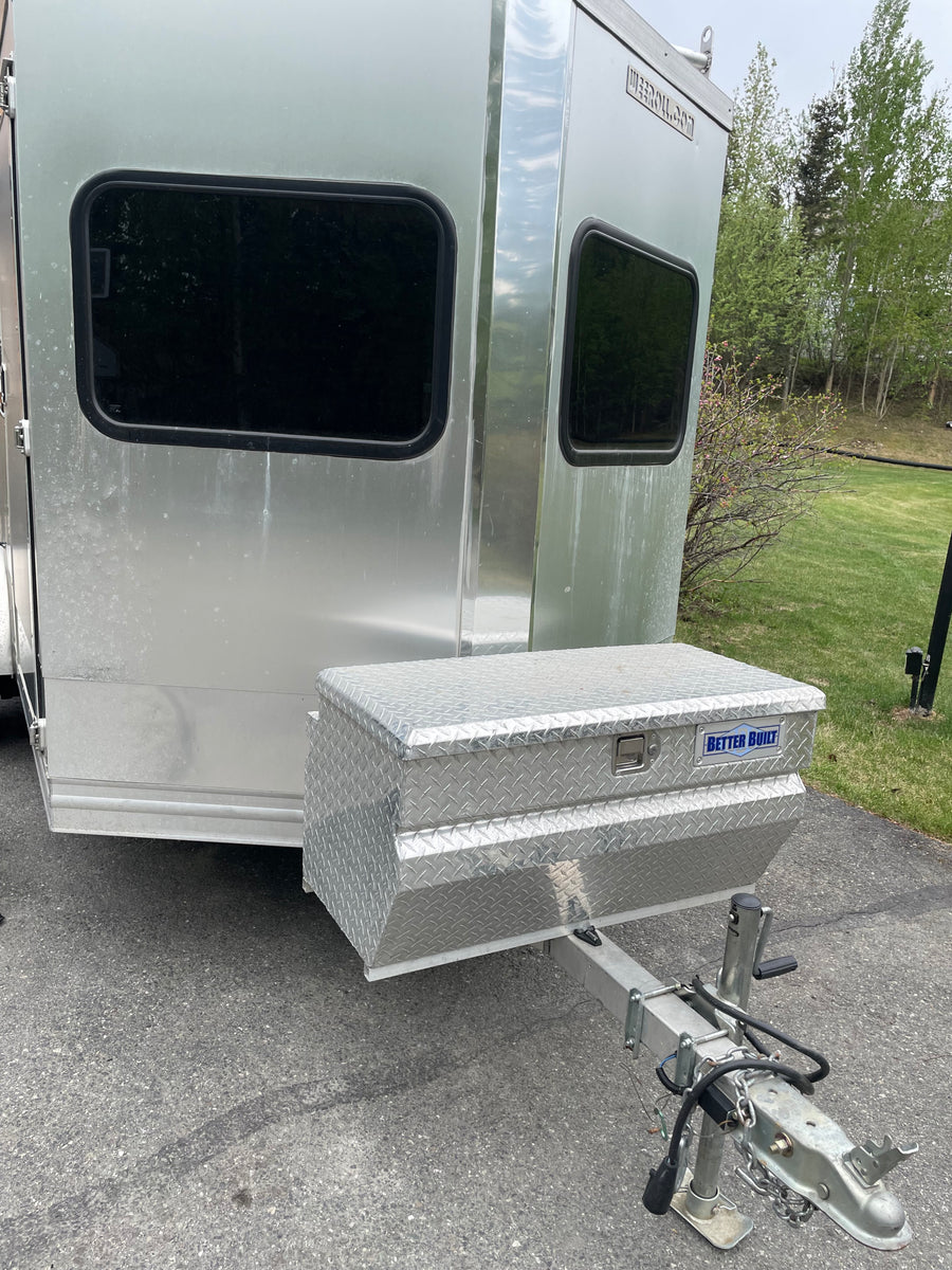 Aluminum RV rental trailer, featuring a diamond plate storage box on the front hitch.