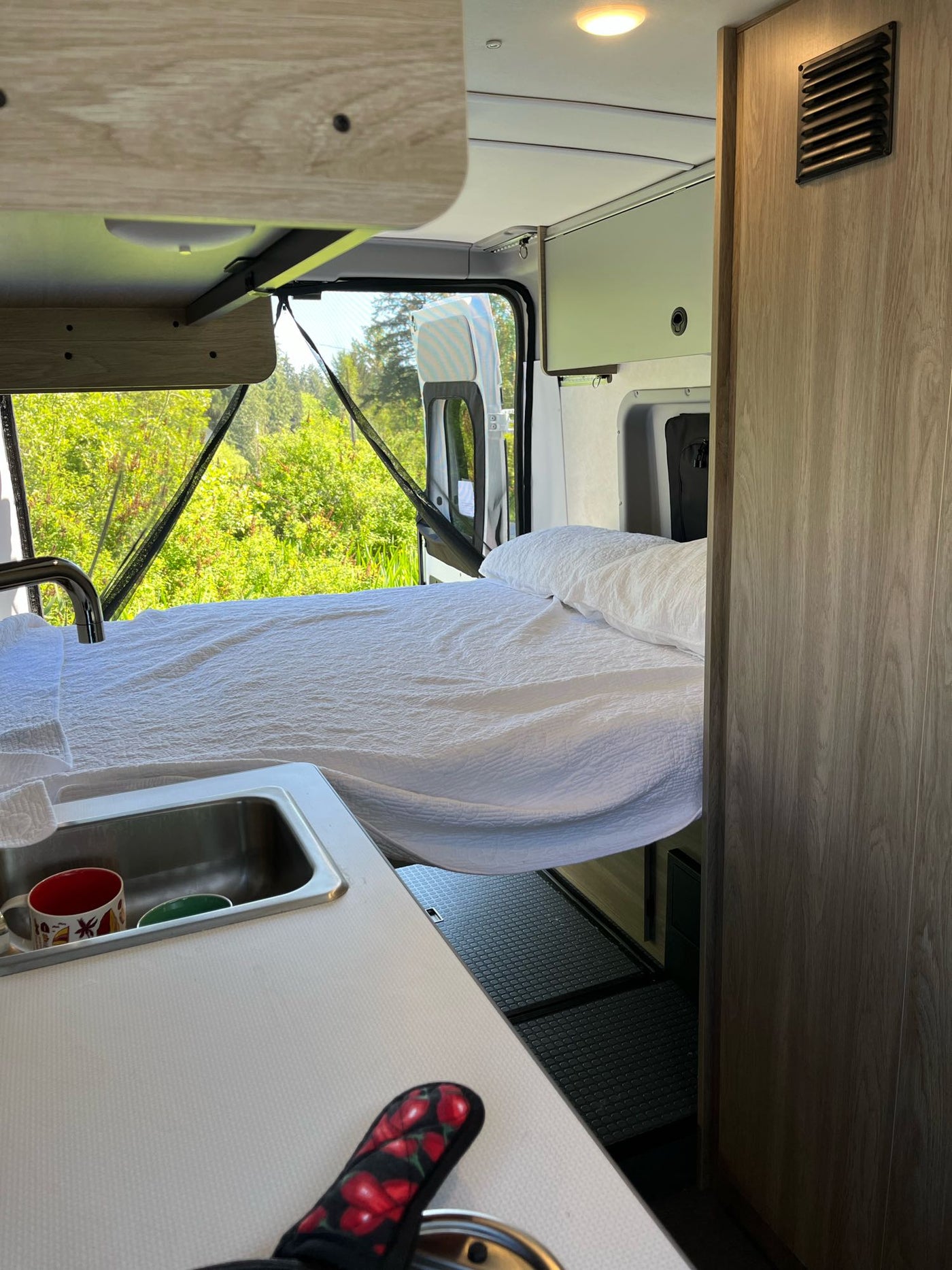perfect for camping cooking.|Inside an RV rental: a compact wet bath with a toilet — photo 12