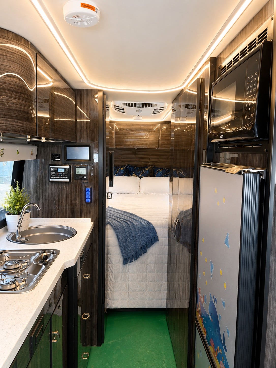 and a cozy bedroom awaits.|RV rental dining area with a renovated table — photo 6